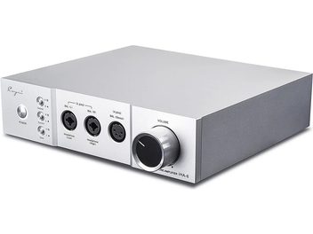 Cayin IHA-6 high-fidelity headphone preamplifier in silver aluminum, three-quarter front right view, low rectangular case with a front panel featuring a power button, three selectors, two 3-pin XLR outputs, one 4-pin XLR output, and a large black volume knob with a metal ring