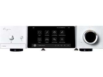 Cayin iDAP-8 network audio player in brushed silver aluminum, front view, featuring a central black touchscreen flanked on the left by a large circular button and a small round key, and on the right by a wide circular dial