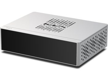 Matrix Audio TT‑1 digital transport in matte silver aluminum, smooth black front panel, S-shaped ventilation pattern on top, perforated side grilles, three-quarter front view