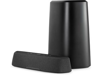 Μαύρη ηχοβαρα Polk Audio MagniFi Mini AX, μπροστινή και πλαϊνή όψη, κατακόρυφο ορθογώνιο σχήμα, μαύρο πλεκτό ύφασμα στην μπροστινή όψη, διευρυμένη βάση