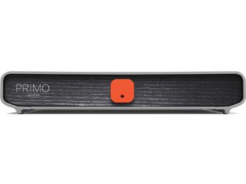 Lecteur audio réseau Volumio Primo V2, vue de face, boîtier rectangulaire, surface texturée noire, bouton central orange