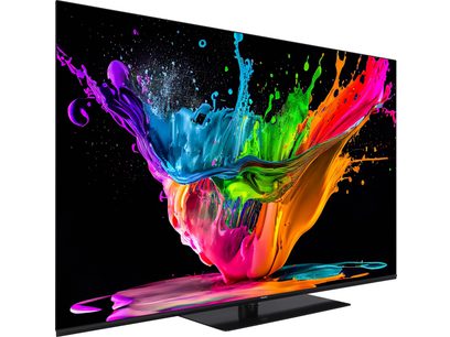 Téléviseur Panasonic TX-65MZ800E affichant une explosion de couleurs vives et fluides sur un fond noir