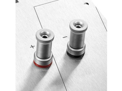 Two threaded metal tips in a bright silver finish, cylindrical in shape with a conical end, on a plain white background