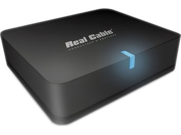 Sort Real Cable iPlug-BTR trådløs sender, afrundet rektangulær form, sølvfarvet logo og skrift på oversiden