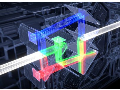 Vidéoprojecteur Sony VPL-XW5000ES noir projetant une structure tridimensionnelle multicolore en filaments lumineux