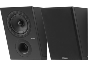 Elipson Prestige Facet II 6ATM Dolby Atmos speakers, matte black trapezoidal cabinets, three-quarter front view showing a mid-bass driver surrounded by a faceted pattern, a circular horn for the tweeter, and a second speaker equipped with a removable acoustic grille