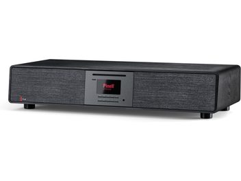 Système haute-fidélité tout-en-un Pinell Supersound 901 noir en bois, vue de trois-quarts avant, boîtier rectangulaire posé sur quatre pieds, façade centrale métallique gris foncé intégrant fente CD, petit écran couleur et rangée de boutons, encadrée de larges grilles d’enceintes en tissu anthracite