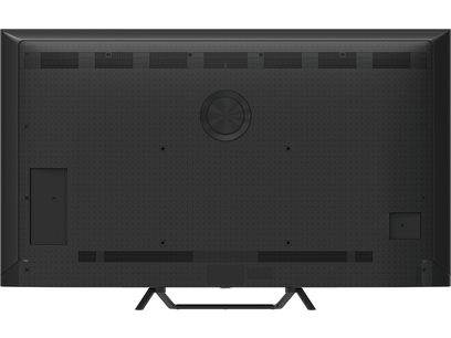 Panasonic TV-65W95BEG black television with textured plastic, rear panel with upper and lower ventilation grilles, protruding central disc, side flaps for connectivity, and inverted V-shaped metal feet, rear view