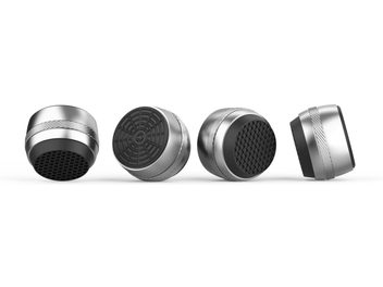 Vibration damper for HI-FI electronics Norstone Design Acousteel Damp 200, silver metallic cylinders, black textured surface, side and front view, circular and hexagonal patterns