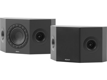 Set di due diffusori surround bipolari Elipson Prestige Facet II 7SR nero opaco con cabinet in legno, forma trapezoidale con doppio pannello frontale inclinato, condotto reflex laterale circolare, woofer circondato da faccette e tweeter incassato, vista tre quarti anteriore