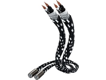 Deux câbles audio RCA tressés noirs et gris avec connecteurs RCA plaqués cuivre, vus de face, en forme de spirale