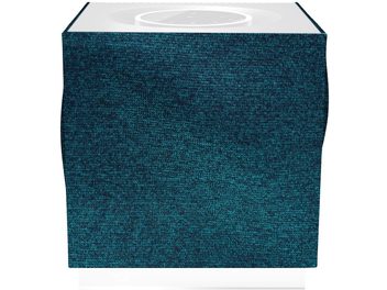 Griglia del diffusore Naim Audio Mu-so Qb 2 blu in tessuto lavorato a maglia blu anatra, vista dall'alto, forma quadrata con un cerchio centrale bianco