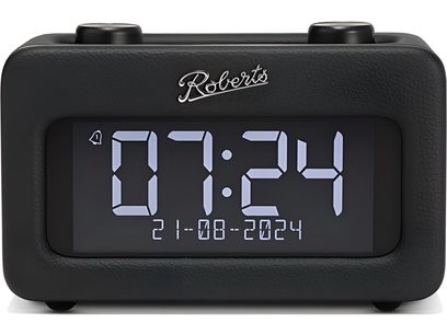 Roberts Revival Rest melnā gultas radio budeklis ar taisnstūra korpusu no graudainas mākslīgās ādas, lielu ciparu displeju un divām riteņveida vadības pogām uz augšdaļas, skats no priekšas