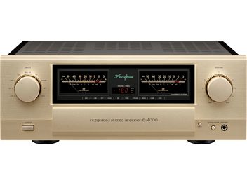 Ampli hi-fi intégré stéréo E-4000, vue de face, finition dorée, 2 grands boutons circulaires, 2 vu-mètres, écran central