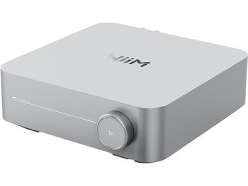 Stereo hi-fi integrated amplifier WiiM AMP silver with a rectangular casing featuring rounded corners, circular button on the front panel