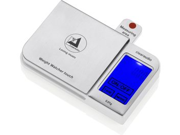 Balance électronique ClearAudio Weight watcher touch argentée avec écran LCD bleu affichant "ON/OFF TARE MODE", vue de dessus