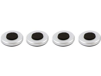 Four black circular pads on cylindrical metal bases, seen from above, arranged in a square on a white background